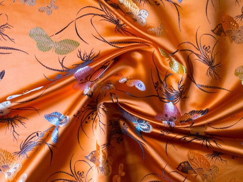 Jaquardstoff Schmetterlinge orange 115 cm breit - Meterware - SBU89